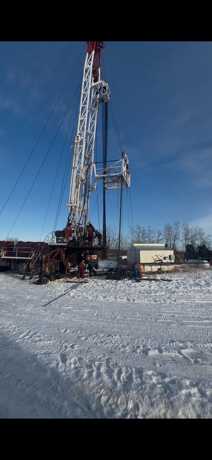 Company-supplied field photo showing rig equipment at Well 6-24